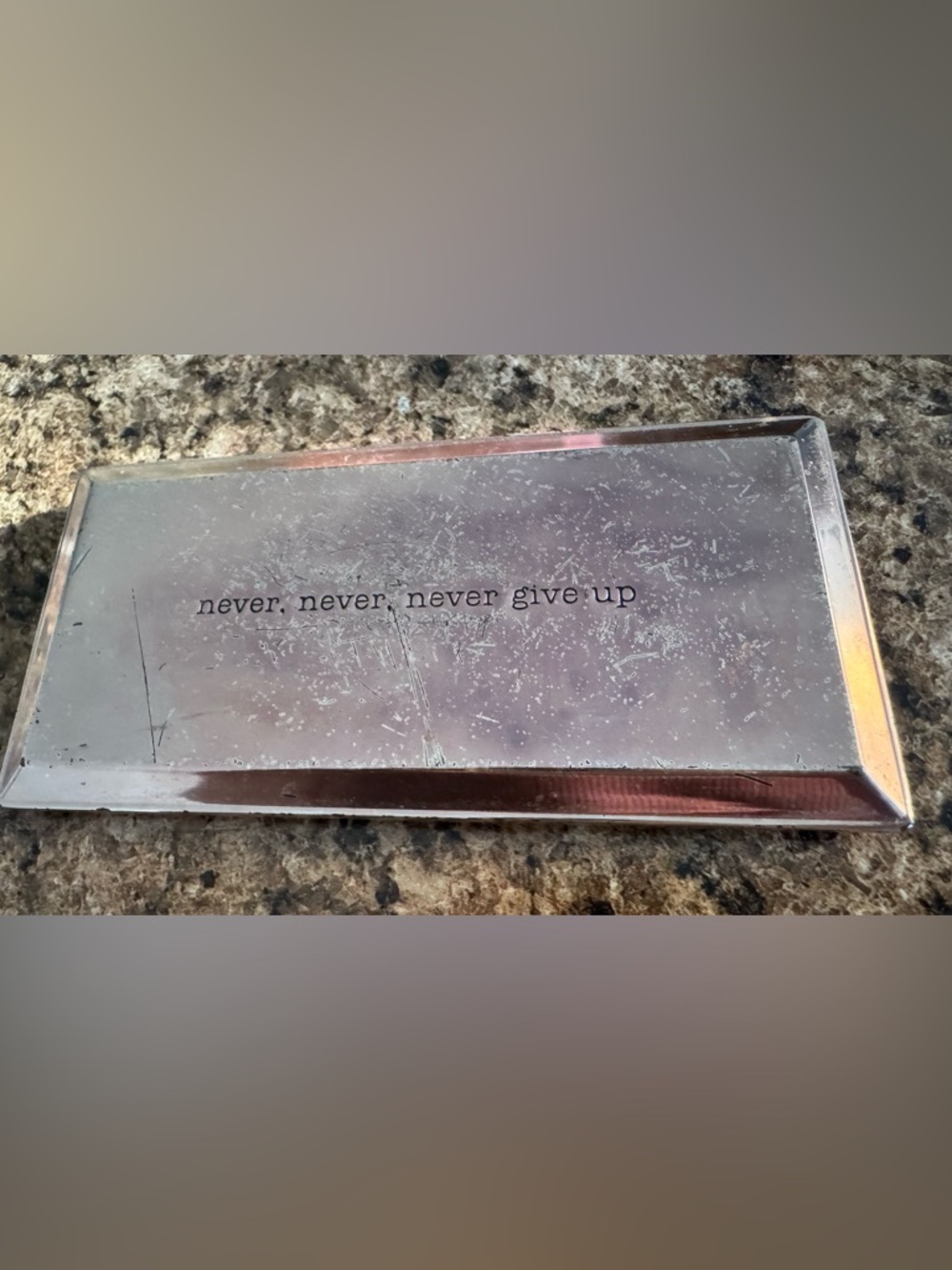 Motivational Silver Paper Weight - "never, never, never give up"